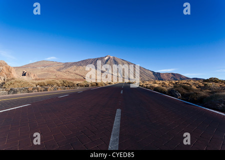 The main road through the Las Canadas del Teide national park with the volcano of Teide, Tenerife, canary Islands, Spain Stock Photo
