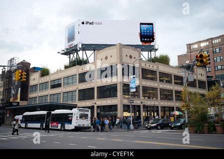 Advertising for the Apple iPad Mini on a billboard atop the Apple store in the the trendy Meatpacking District in New York Stock Photo