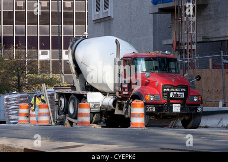 Rear-discharge concrete transport truck on construction site - USA Stock Photo