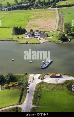 The Netherlands, Eck en Wiel, Ferry crossing Rhine river. Aerial. Stock Photo