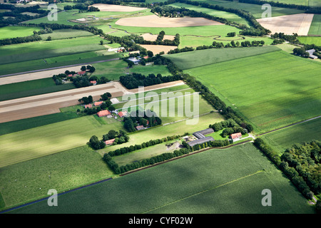 The Netherlands, Stadskanaal. Farms and farmland. Aerial. Stock Photo