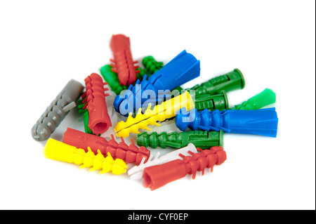 Isolated colorful wall plugs on white background Stock Photo