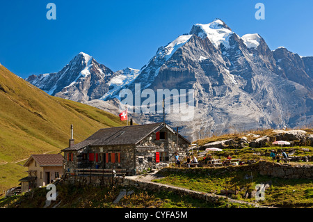 Mountain refuge Rotstock Hut in front of Mt Moench and Mt Jungfrau, Muerren, Bernese Oberland, Switzerland Stock Photo