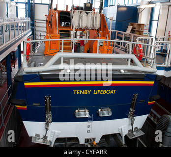 View of the RNLI Tenby Lifeboat - Haydon Miller - in it's boathouse at Tenby, Pembrokeshire, Wales. Stock Photo