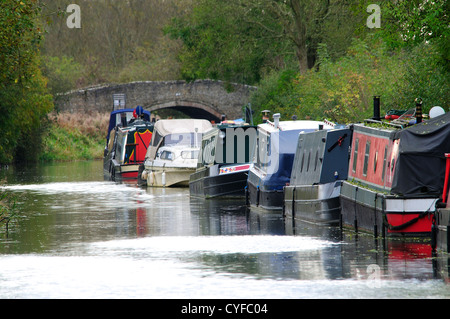 A line of canal boats moored at Lower Heyford Wharf, Oxford Canal Stock Photo
