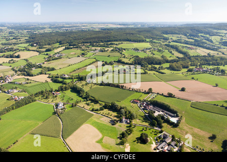 The Netherlands, Epen, Half timbered farms and farmland. Aerial. Stock Photo