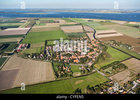 The Netherlands, Dreischor, View on the circular village center and farmland. Aerial. Stock Photo