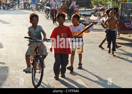 Street Kids playing in the Street in Phnom Penh, Cambodia Stock Photo ...