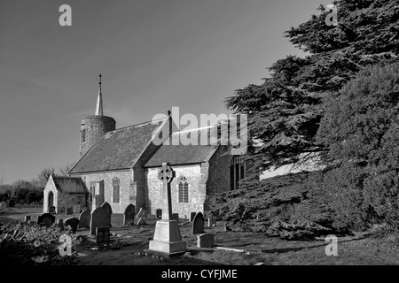 Black and White St Marys church with its distinctive round tower in the village of Titchwell, North Norfolk Coast; England; UK Stock Photo