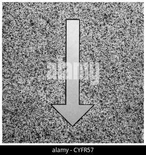 keyboard symbols on the pavement in front of the uinversity library Berlin: arrow down. Stock Photo