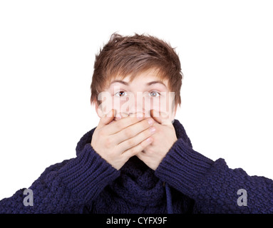 Teenager in a purple sweater shut his mouth with his hands Stock Photo