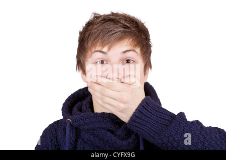 Teenager in a purple sweater shut his mouth with one hand Stock Photo