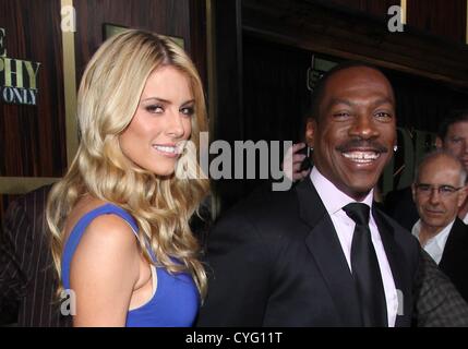 Paige Butcher and Eddie Murphy attend the arrivals of the World