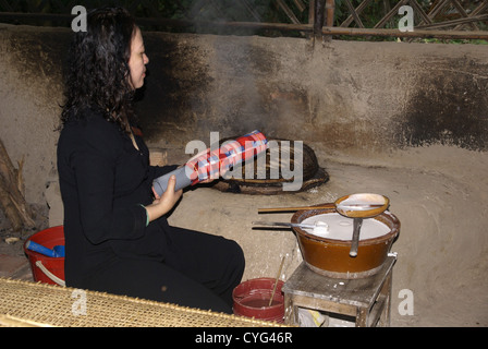 Vietnamese woman making rice paper, Ben Dinh, Cu Chi, near Ho Chi Minh City, (Saigon), Vietnam Stock Photo