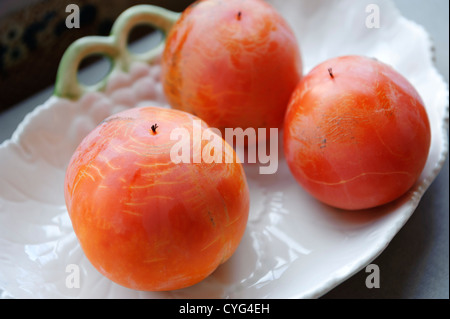 Kaki Persimmons or Sharon fruit Stock Photo