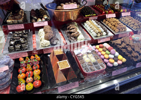 Marzipan & chocolate sweets for sale sweetshop Pasteleria traditional bakery, Madrid, Spain Stock Photo
