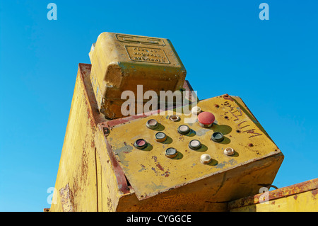 The old machine against the blue sky. Stock Photo