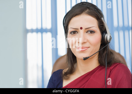 Portrait of a female customer service representative Stock Photo