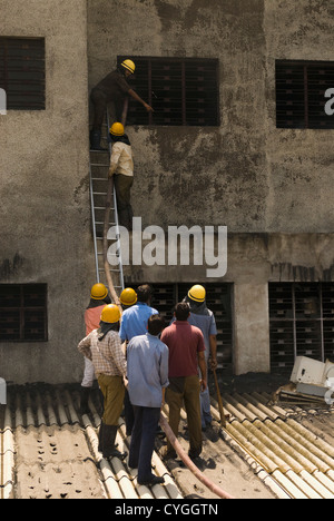 Firefighters during a rescue operation, Gurgaon, Haryana, India Stock Photo