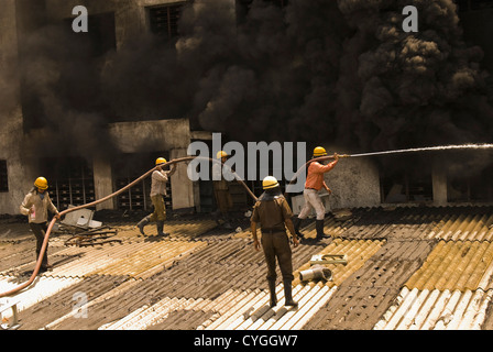 Firefighters during a rescue operation, Gurgaon, Haryana, India Stock Photo