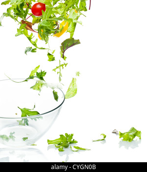 Flying salad. Isolated over white. Stock Photo