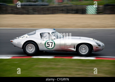 A hardtop E-type Jaguar racing at Brands Hatch racing circuit. Stock Photo