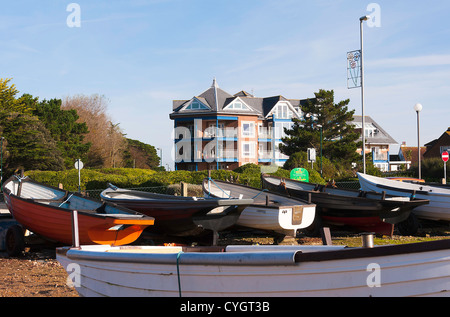 Small Inshore Fishing Boats in Park with Residential Home Apartment Block Aldwick Bognor Regis West Sussex England UK Stock Photo