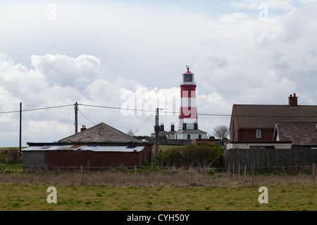 Happisburgh Light House, and associated homes. Norfolk. England. Stock Photo