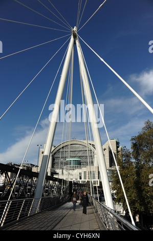 Hungerford footbridge across the road from, Embankment Underground.  London. Stock Photo