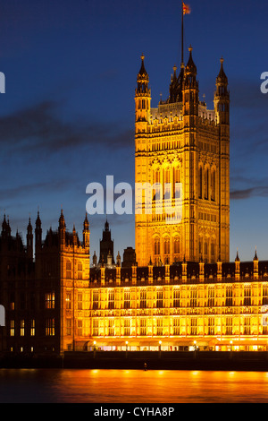 Twilight over Victoria Tower and the House of Parliament along River Thames, London England, UK Stock Photo