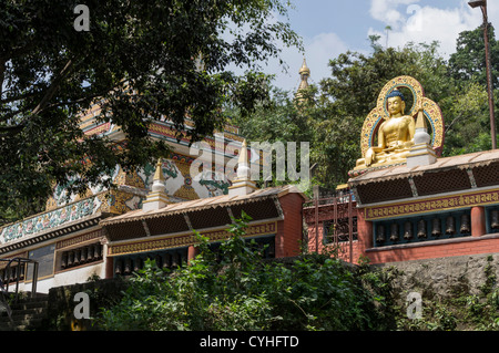 Buddhist temple in kathmandu, nepal with big sitting buddha on top Stock Photo