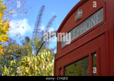 Red phone box close up in the Autumn, London, England.  Near Abbey Road Studio. Stock Photo