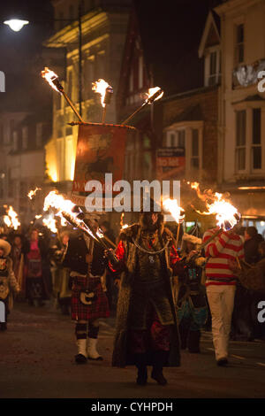 Lewes bonfire societies parade down the High Street of Lewes in East ...