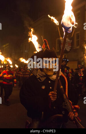 Lewes bonfire societies parade down the High Street of Lewes in East ...