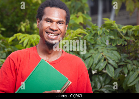 Smiling young student from south east asia Stock Photo