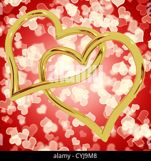 Gold Heart Shaped Rings On Red Bokeh Represents Love And Romance Stock Photo