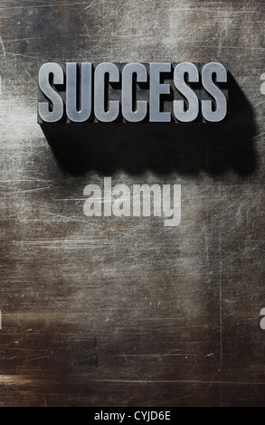 Old Metallic Letters:Success - metal background Stock Photo