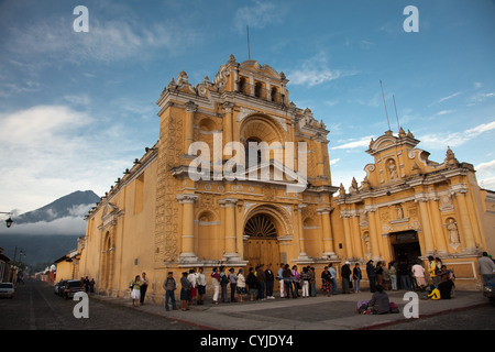 Locals line up early at Hermano Pedro's Hospital in Antigua. Stock Photo