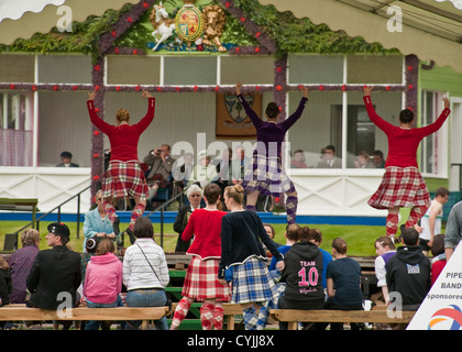 Scottish dancers performing in front of the Royal Family at the Braemar Highland Games ('Braemar Gathering'), Scotland Stock Photo