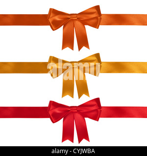 Set of ribbon bows - red, yellow, orange on white background. Clipping path for each bow included. Stock Photo