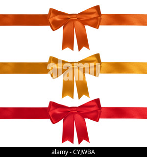 Set of two beautiful ornate perfect holiday handmade gift bows made of  bright red silk ribbon taken from different angles isolated on a white  background. Closeup, clipping path. Stock Photo