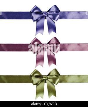 Set of ribbon bows - green, pink, violet on white background. Clipping path for each bow included. Stock Photo
