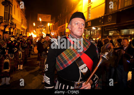 Pipe band play during Bonfire Night celebration in Lewes, East Sussex, UK which form the largest Guy Fawkes Night festivities. Stock Photo