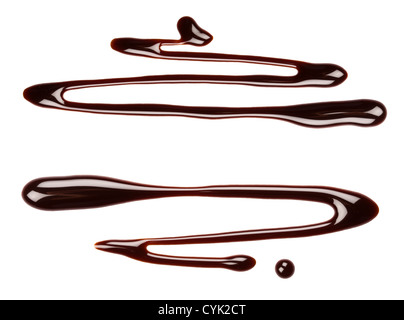 Chocolate syrup drips, isolated on white background Stock Photo