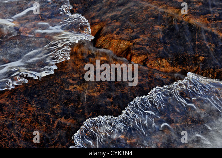 Winter stream with open water and ice formations, Greater Sudbury, Ontario, Canada Stock Photo