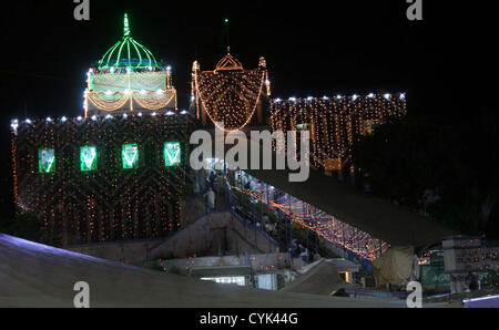 A beautiful illuminated view of the Shrine of Hazrat  Abdullah Shah Ghazi (R.A) on the event of his Annual Urs at his Shrine in Karachi on Tuesday,  November 06, 2012. Devotees flock to the Shrine to celebrate the Urs (death anniversary) of the  Ghazi (R.A), from the 20th to the 22nd of the lunar month, this year corresponding to the 6th, 7th  and 8th of November. Stock Photo