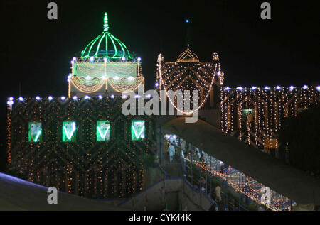 A beautiful illuminated view of the Shrine of Hazrat  Abdullah Shah Ghazi (R.A) on the event of his Annual Urs at his Shrine in Karachi on Tuesday,  November 06, 2012. Devotees flock to the Shrine to celebrate the Urs (death anniversary) of the  Ghazi (R.A), from the 20th to the 22nd of the lunar month, this year corresponding to the 6th, 7th  and 8th of November. Stock Photo