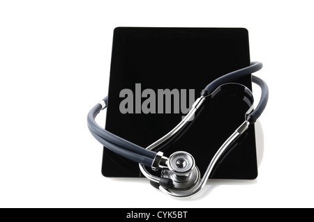 A tablet computer with a Stethoscope wrapped around. Horizontal format with reflections on a white background. Stock Photo
