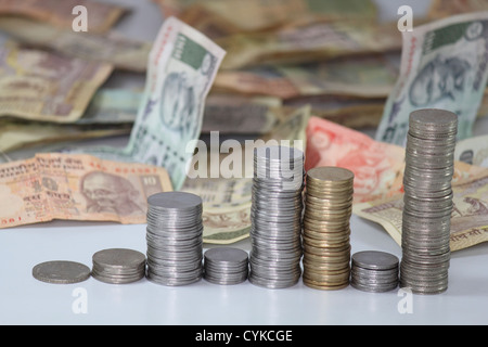 Indian Coins Stack in form of bar graph with Indian Rupees Stock Photo