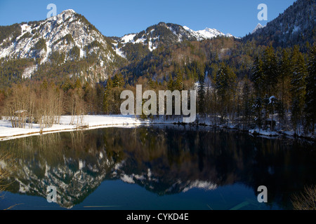 Lake Christlessee in winter at trettach valley near oberstdorf, idyllic ...